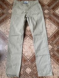 Брюки чинос