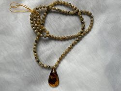 Бурштинове намисто янтарь цільний 21,8 г 63 см