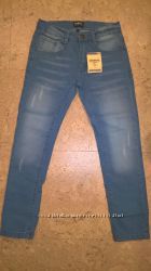 Новые стрейтчевые джинсы на девочку Oshkosh голубого цвета 8, 14 лет