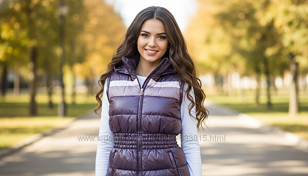 Пуховая женская жилетка demix.