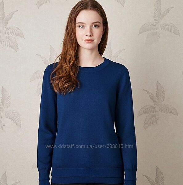 Шерстяной свитер цвета морской волны.