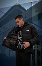Куртка зимняя чёрного цвета The North Face на пуху