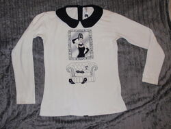 Модная трикотажная блуза в школу