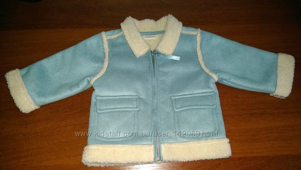 Продам  тёплую курточку дублёнку для ребёнка от 6 до 12 месяцев