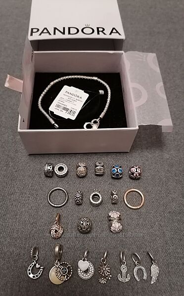 Браслет та шарми Pandora 