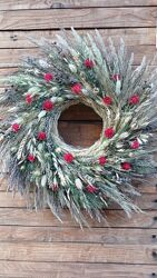 Різдвяний вінок  традиційна прикраса, що символізує вічність, коло життя, 