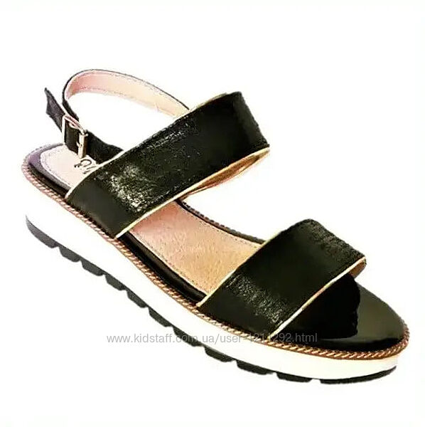 Жіночі босоніжки на танкетці