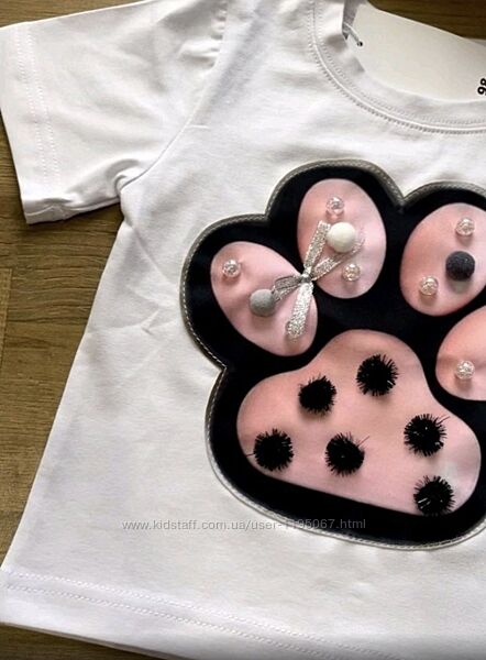 Біла футболка з табалапкою