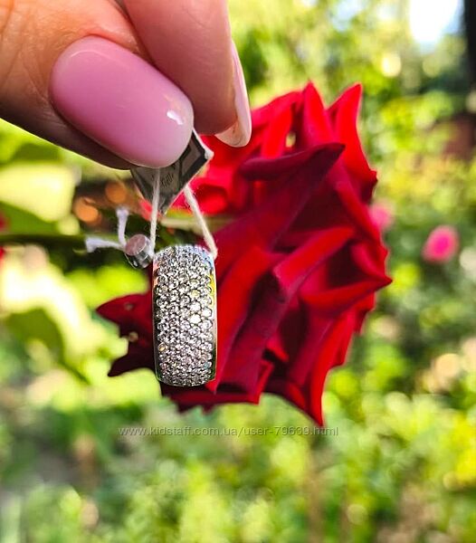 Срібна жіноча каблучка з фіанітами