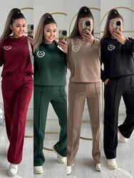 Спортивний теплий жіночий костюм