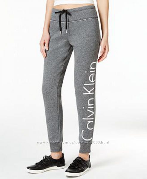  Фирменные трикотажные теплые спортивные брюки  серый меланж Calvin Klein 