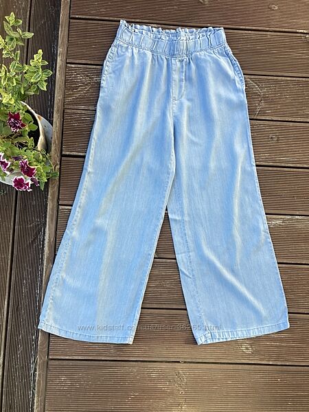 Джинси блакитні тонкі YFK на 140-146 см