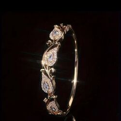 Ажурний браслет в позолоте