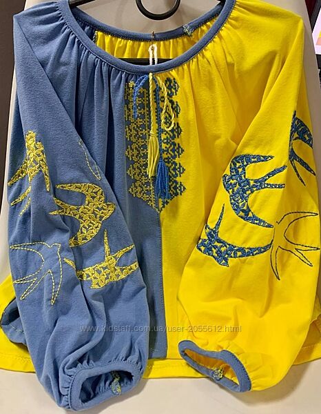 Жовто-блакитна вишиванка для дівчинки з ластівками трикотаж