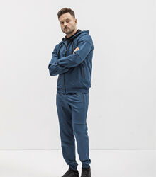 Спортивний костюм із кофтою на застібці та швами на штанах