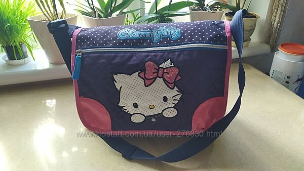 Зручна вмісна сумка з розширенням і великою кількістю карманів